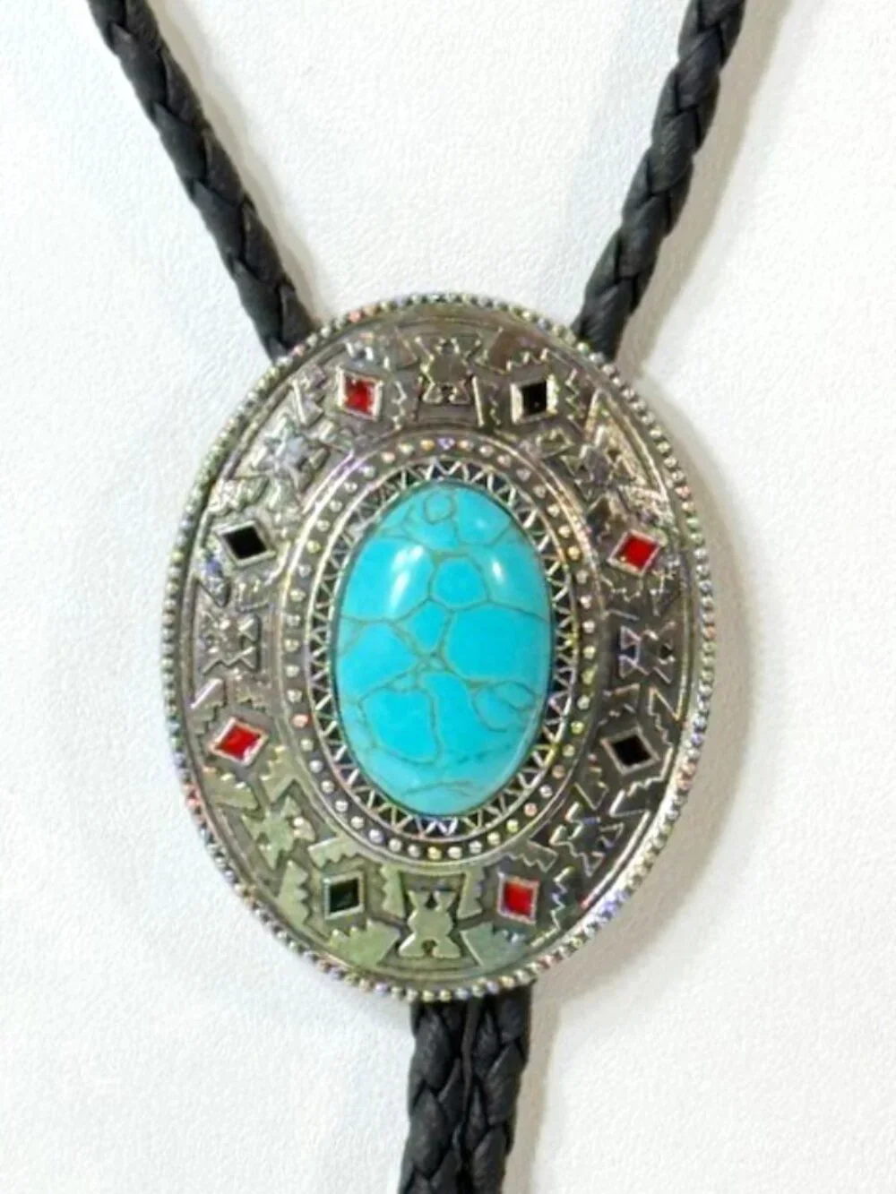 Turquoise-tone, silver-tone and black cord western cowboy bolo tie